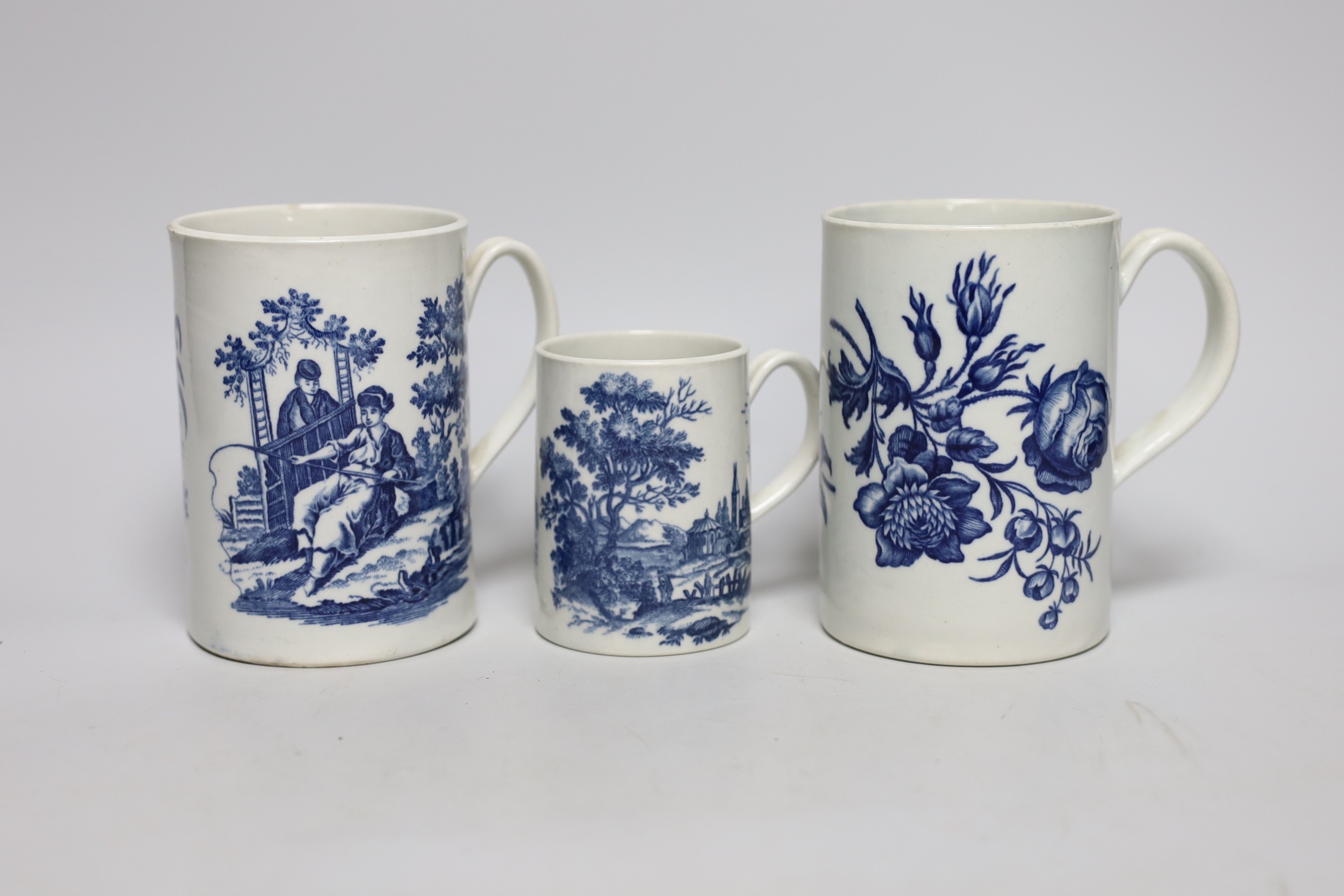 Three 18th century Worcester mugs, Three flowers, La Promenade, 12.5cms high